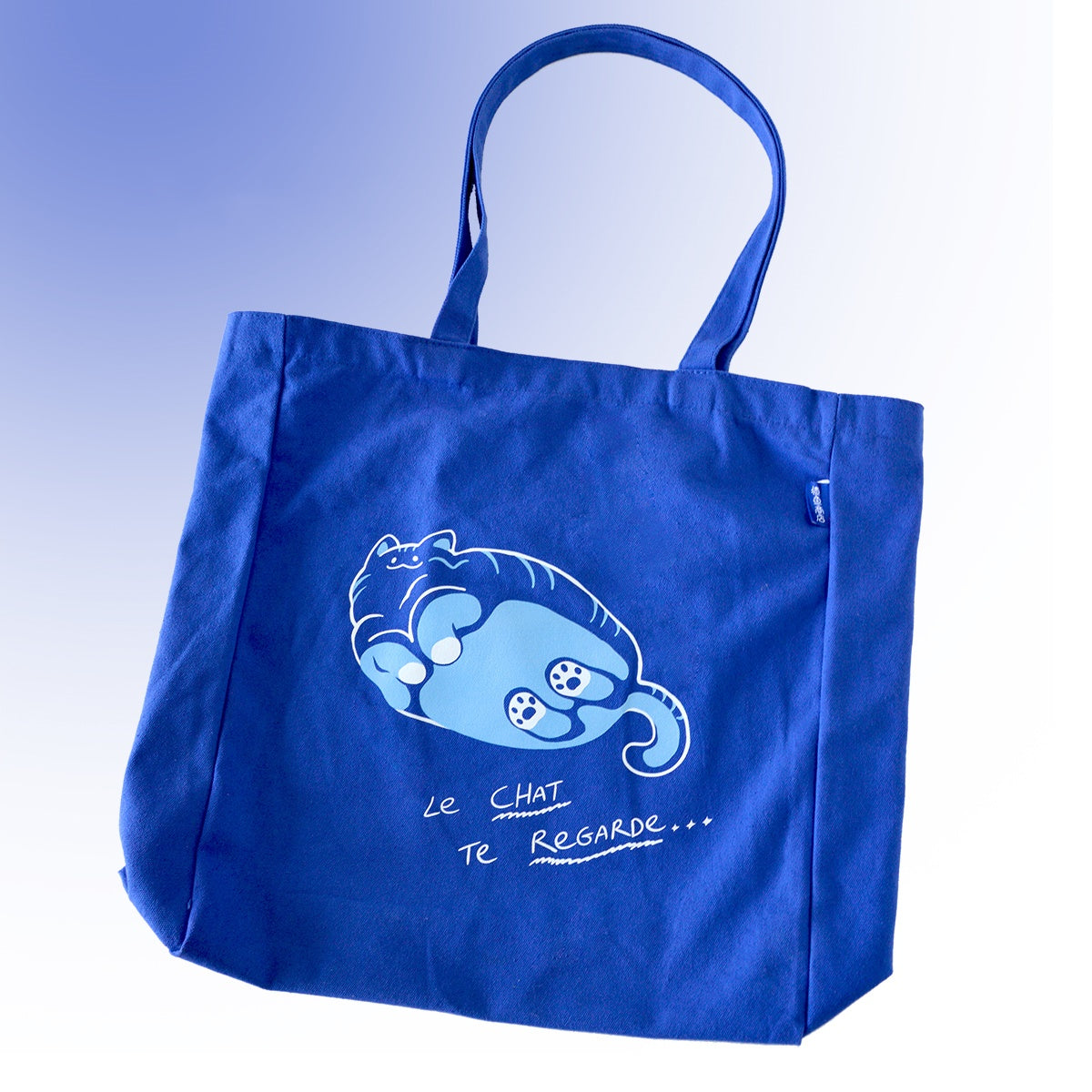 Blue Tabby Cat on Glass Canvas Shopping Tote it is an ideal bag for beach, teachers, nurse, work, travel, swimming, sport, yoga, dance, travel, carry-on, luggage, camping, hiking, team work picnic, party, gym, library, spa, trade show, wedding, conference, etc.