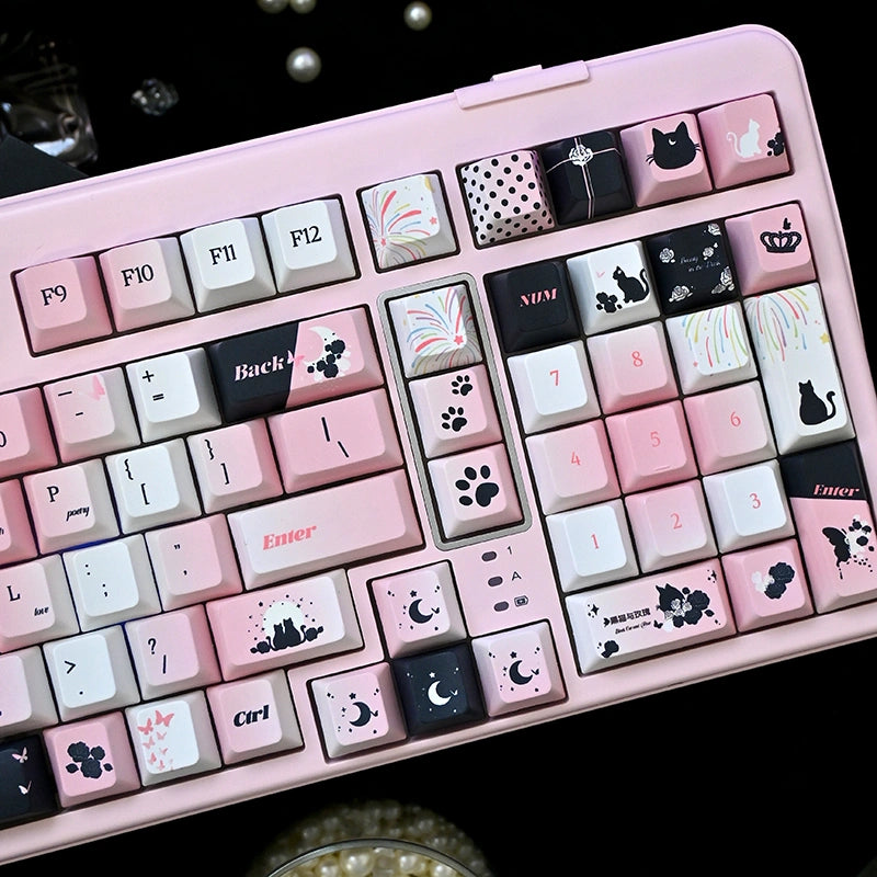 Black and pink keycap set with adorable cat prints for mechanical keyboards