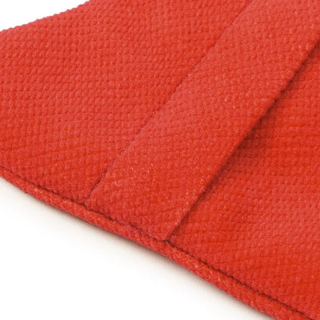 Backside of the cat-shaped coin purse with tail-shaped zipper pull