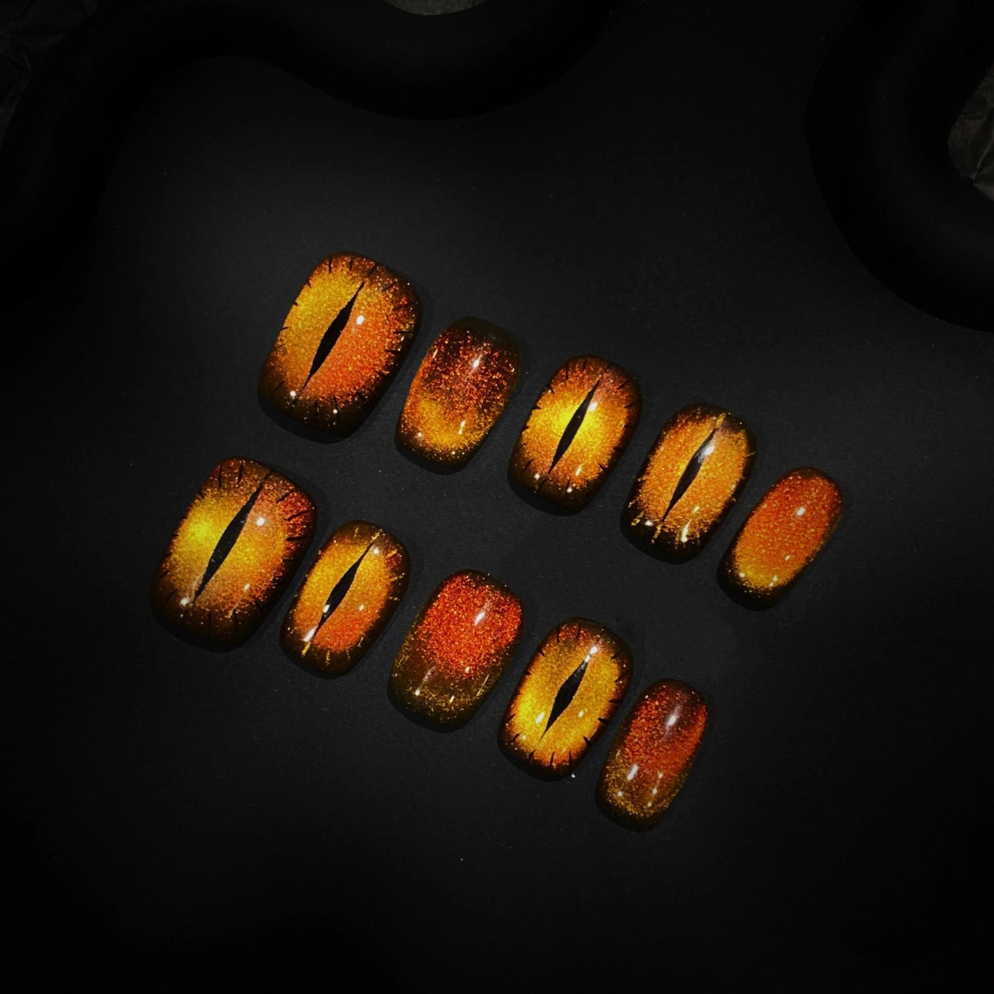 Fiery orange and black Flaming Feline Fierce press-on nails perfect for cat lovers and statement looks