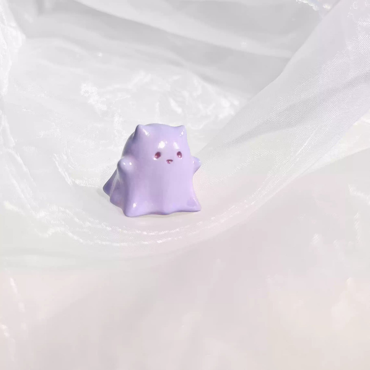 Halloween ghost kitten keycap, Ghostly Whiskers, a spooky and cute addition to any mechanical keyboard.