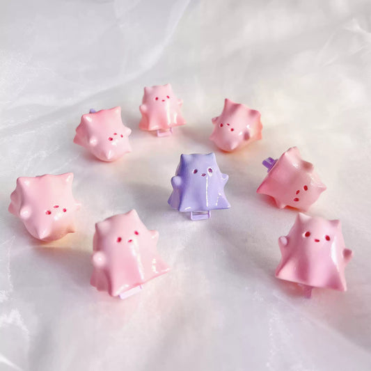 Ghostly Whiskers keycap featuring a ghost kitten, ideal for cat lovers and gamers looking for a Halloween-themed keyboard accessory.