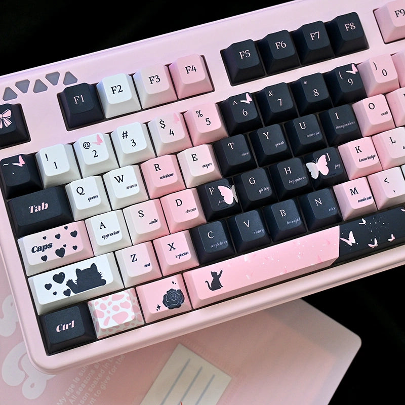 Midnight Rose Keycap Set featuring a black and pink cat-themed design on a mechanical keyboard