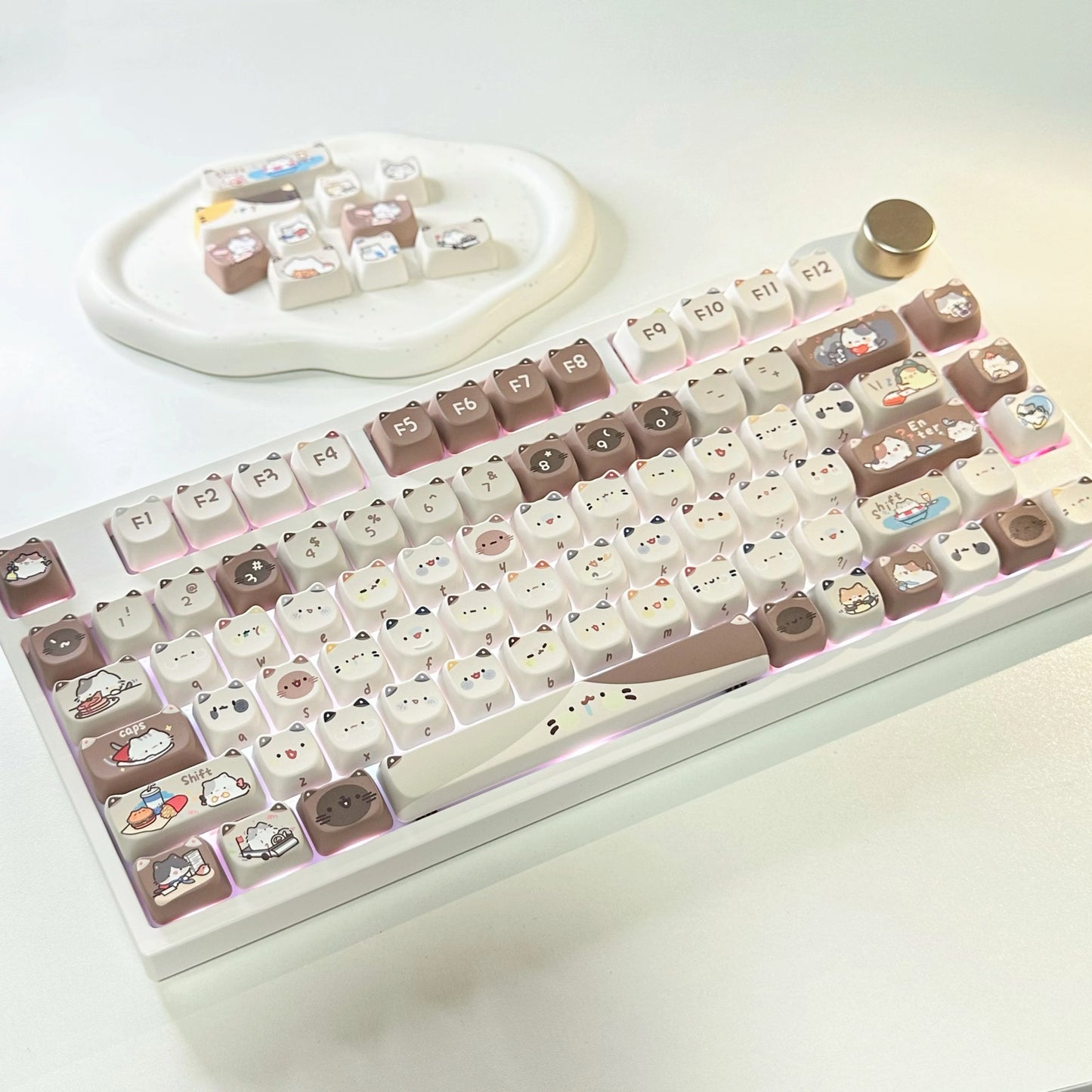 Top view of the Mocha Cat Keycap Set with playful cat faces