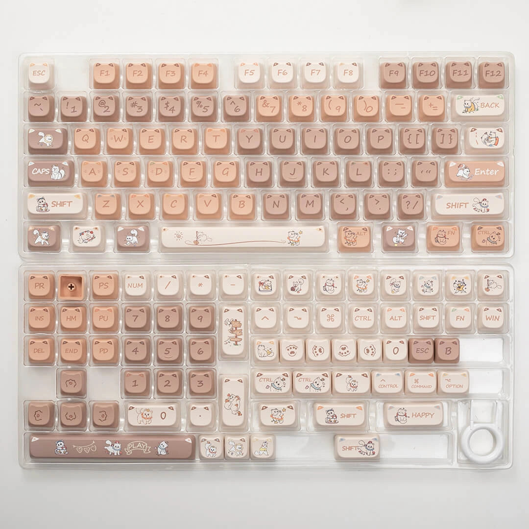 Full layout of the Naughty Cat Keycap Set showcasing all keys with cat-themed prints in a brown and beige color palette.