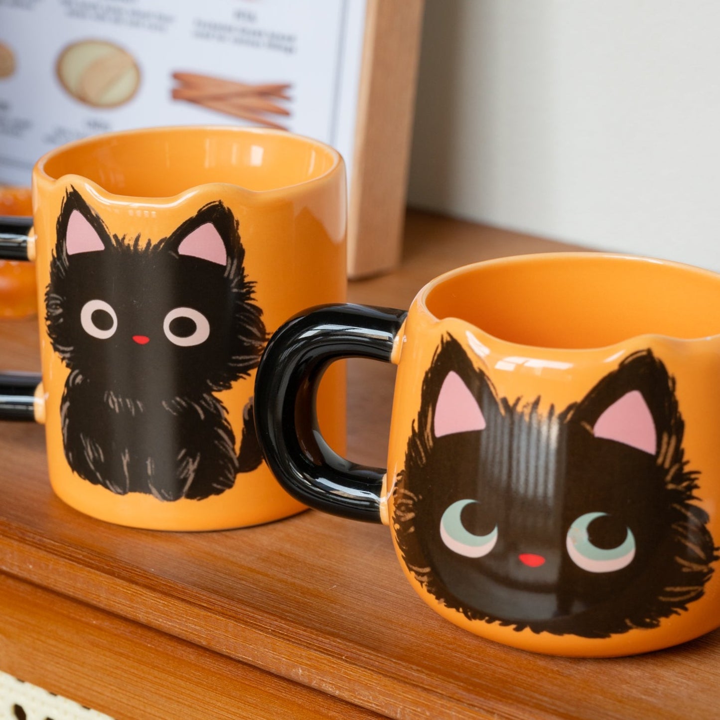 Love My Sweet Cat Coffee Mug, two orange ceramic coffee mug with cute fluffy black cat print, one just with the cute oversized cat head, and another one with the whole body