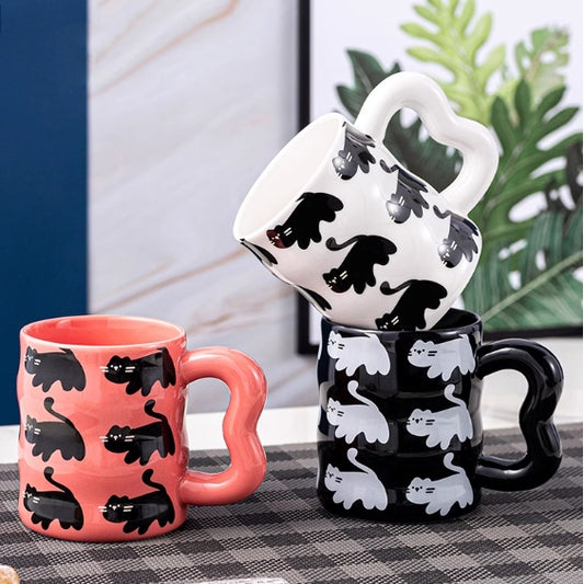 Black Cat Forever Coffee Mug, handmade ceramic coffee mug, 3 colors, pink, white and black cat print coffee mug on the table