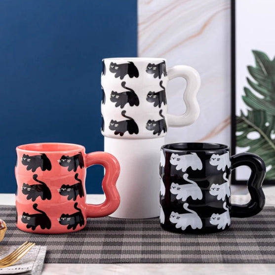 Black Cat Forever Coffee Mug, handmade ceramic coffee mug, 3 colors, pink, white and black cat print coffee mug on the table