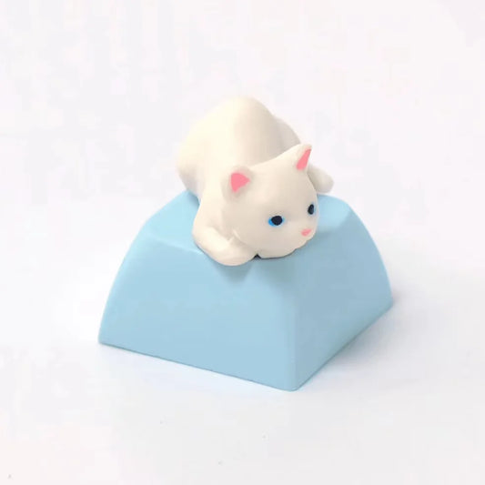 Blue Eyed White Cat Mechanical Keyboard Keycap on a Blue Base