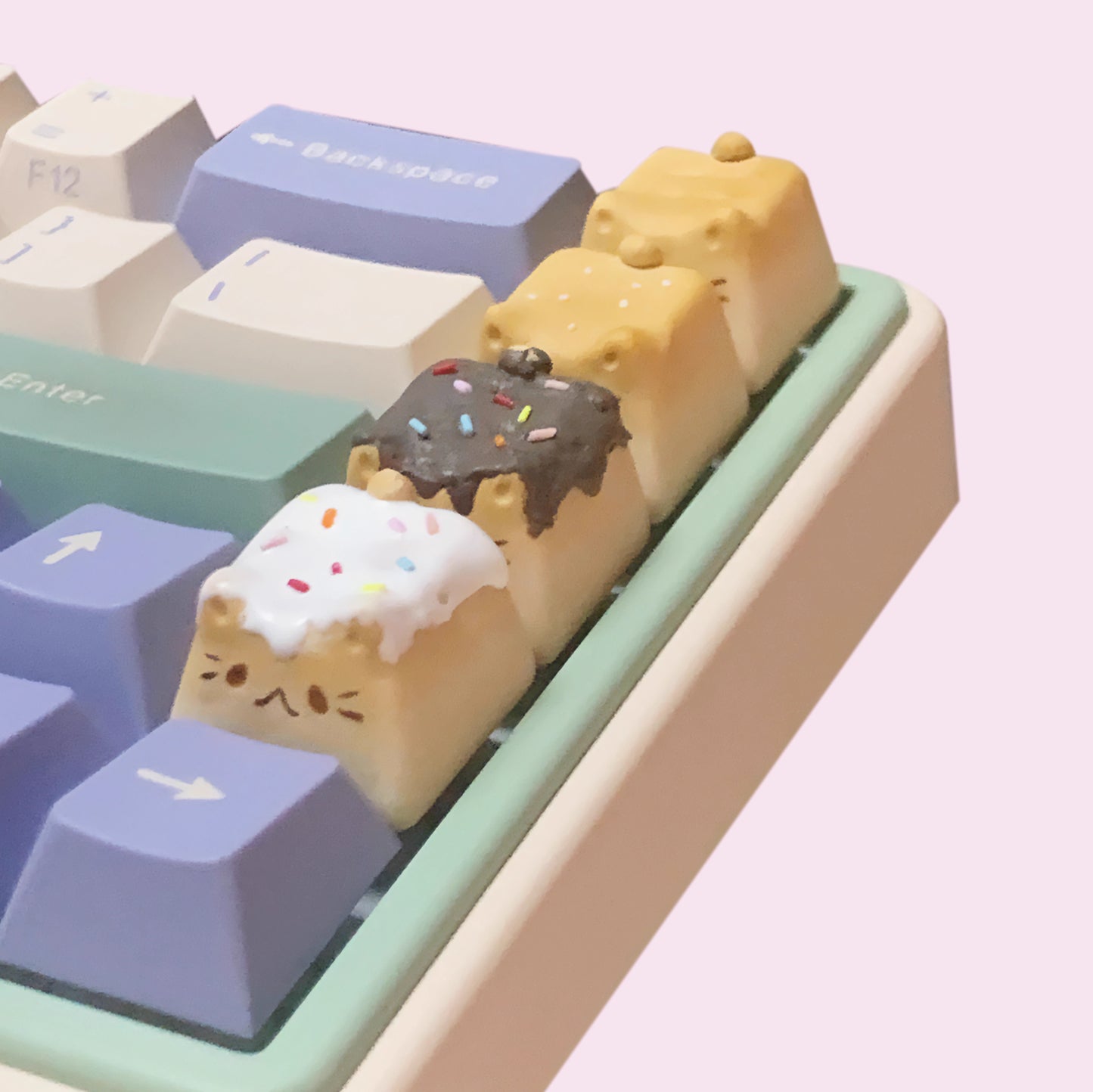 Handmade Bread Cat Mechanical Keyboard Keycap Sesame Bread, White Bread, Vanilla Bread, and Chocolate Bread on a Mechanical Keyboard