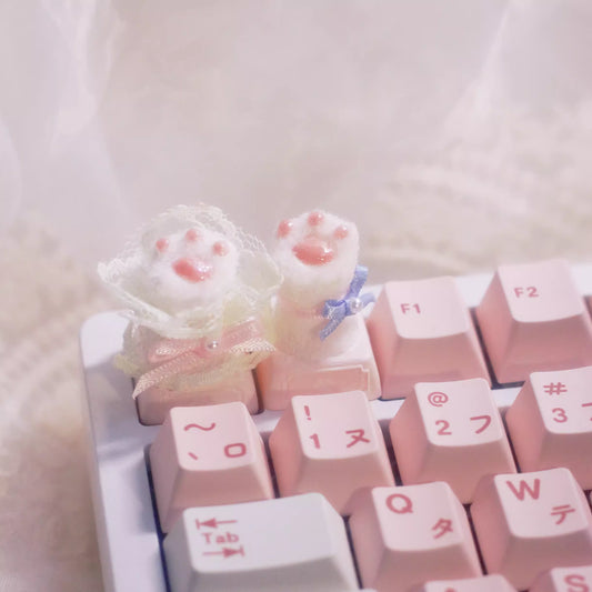 Handmade Wedding Cat Paw Mechanical Keyboard Keycap in Bouquet and Bowknot on a keyboard with other pink key caps in Japanese