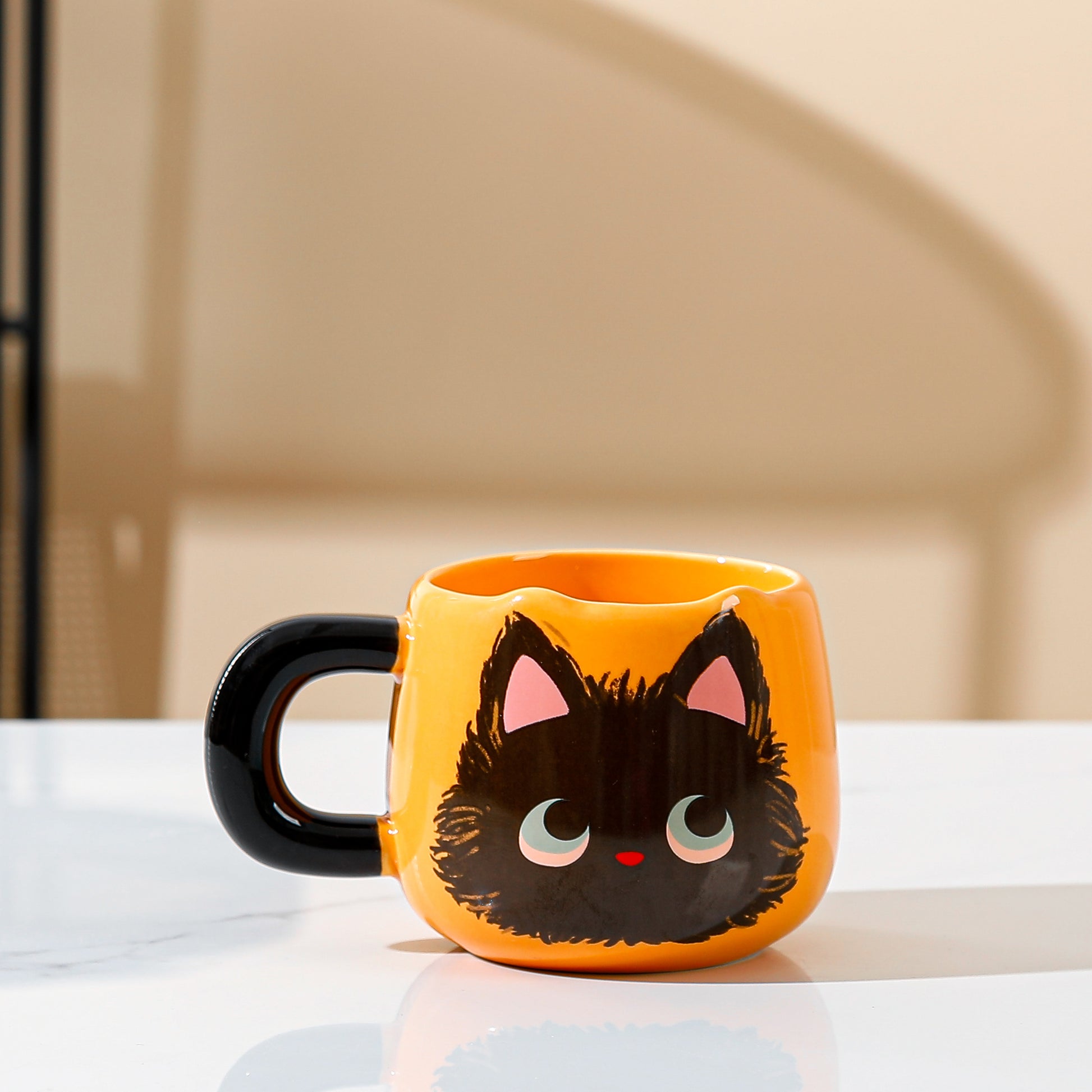 Love My Sweet Cat Coffee Mug, Orange Mug with Cute Fluffy Black Cat Print, Handmade Coffee Mug on the table