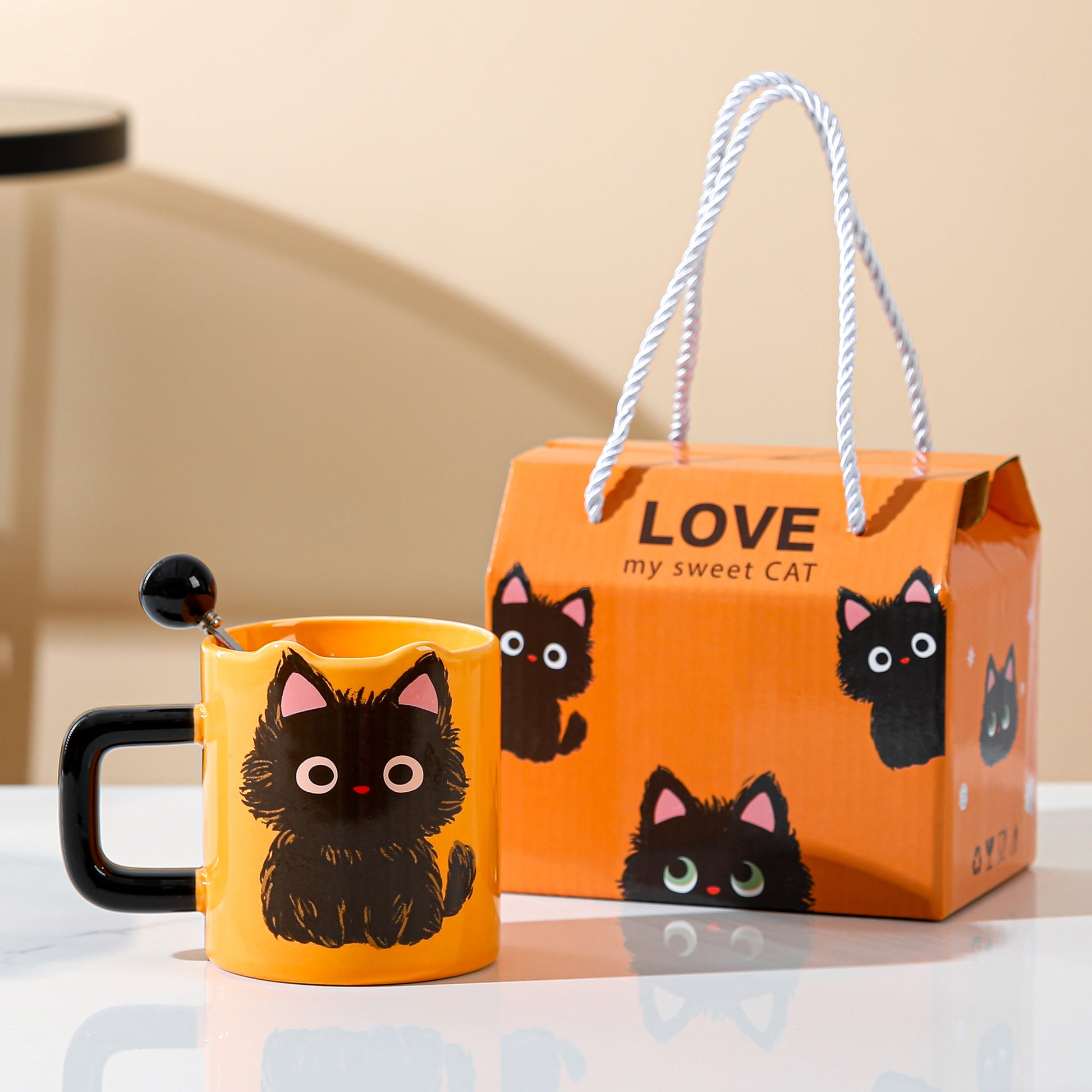 Love My Sweet Cat Coffee Mug, Orange Mug with Cute Fluffy Black Cat Print, Handmade Coffee Mug with Cute Cat Tail Styled Spoon, behind is the cute package