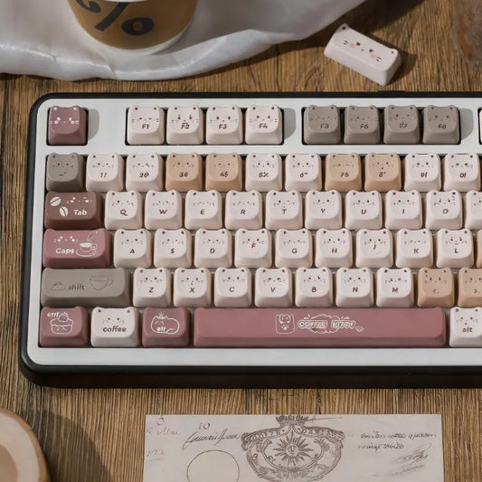 Cozy cafe themed MAO profile keycaps with coffee bean and cat face motifs.