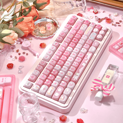 Cute pink mechanical keyboard setup featuring MAO profile cat ear keycaps.