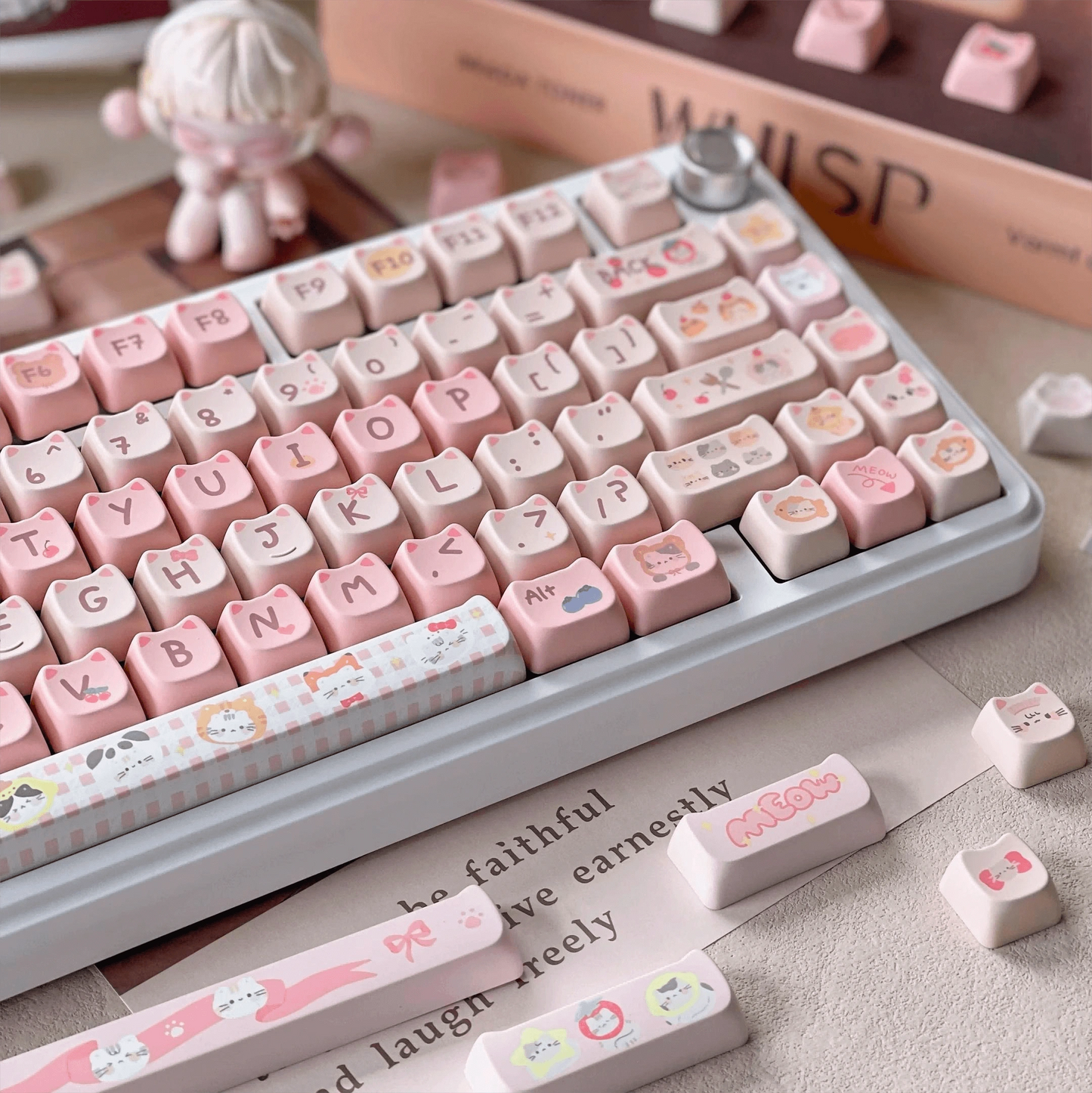 Cute pink cat-themed keycap set featuring fruit designs