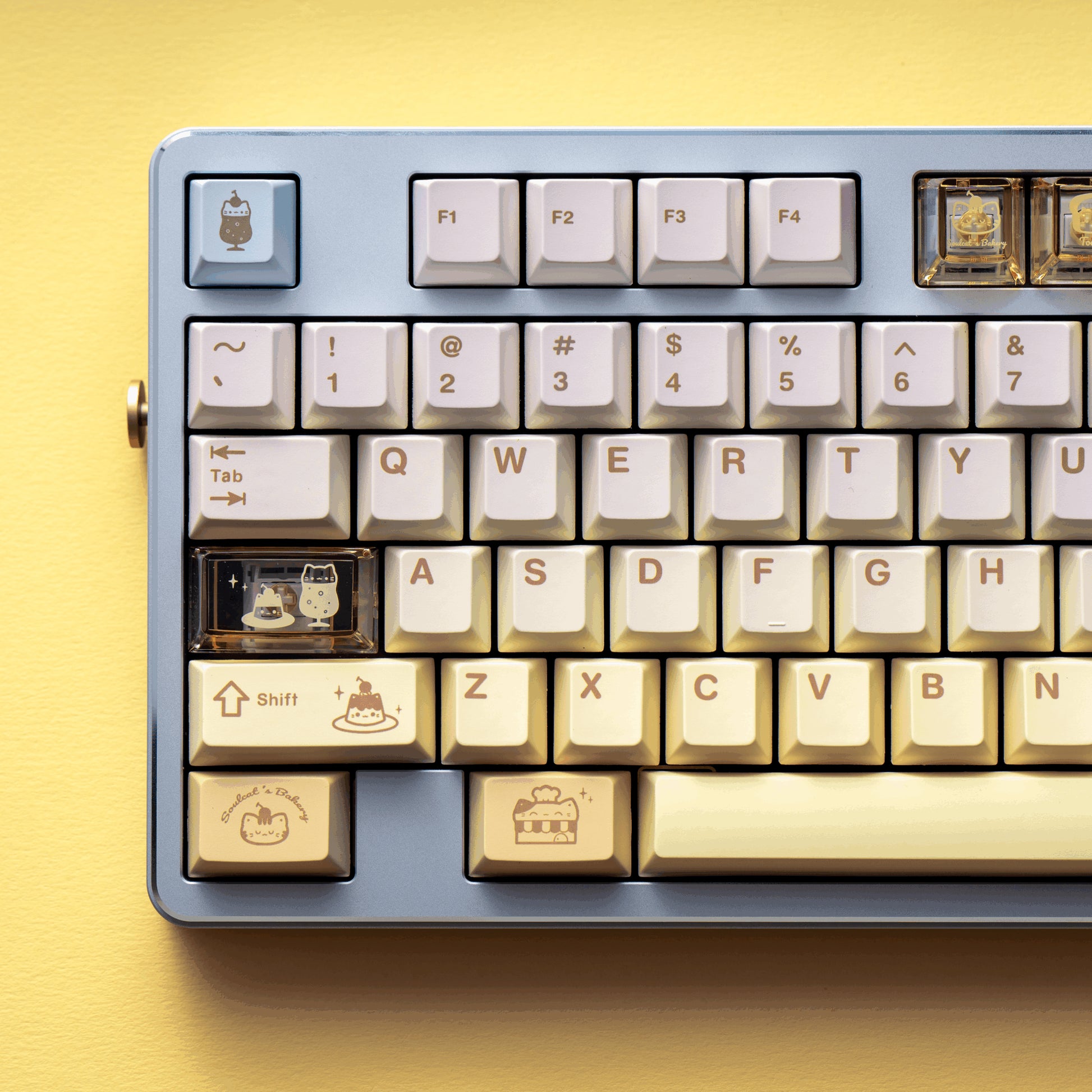 Baking Meow Meow cat keycap set in yellow, brown, and blue with 167 keys

