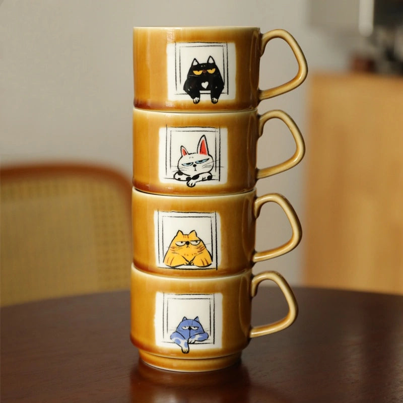 Cat-astrophic Mischief Cat Coffee Mug featuring tuxedo, white, ginger, and black cats, perfect for cat lovers.