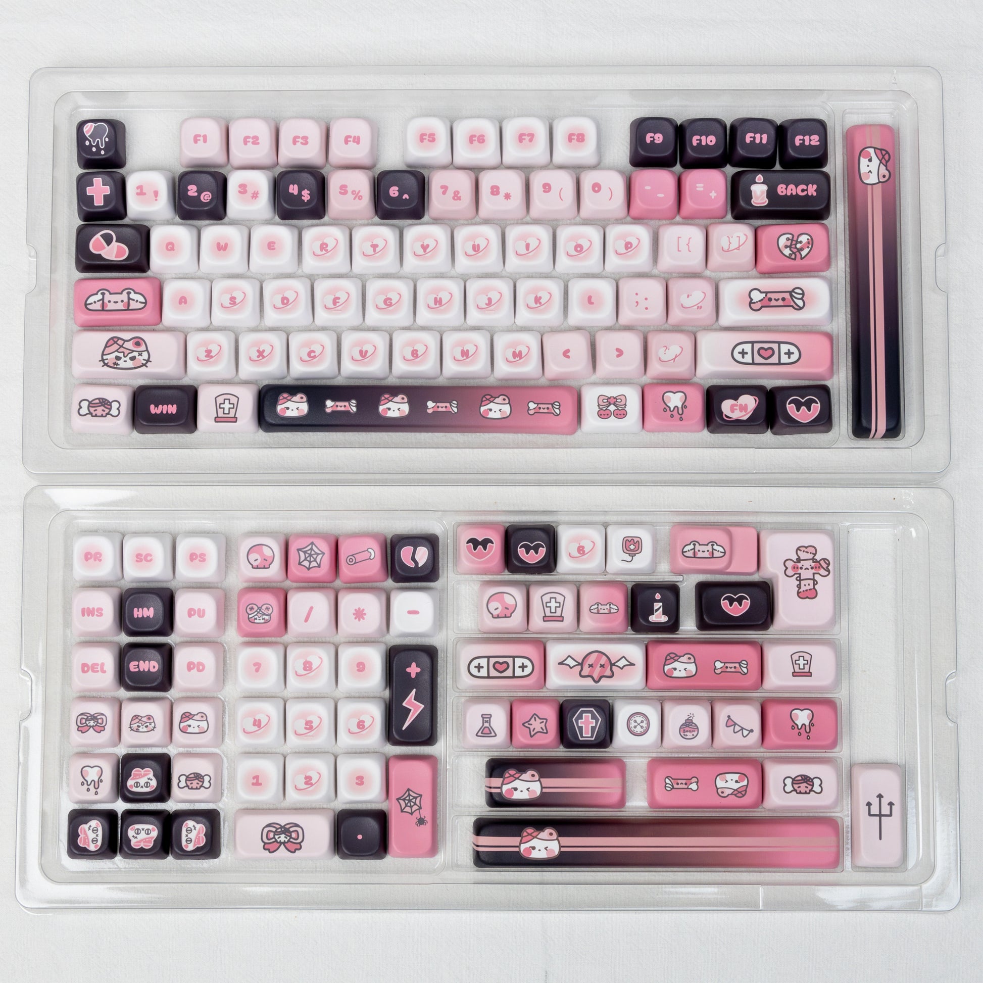 Playful pink and black keycap set with cute cat designs, great for gamer girls and Y2K fashion fans.