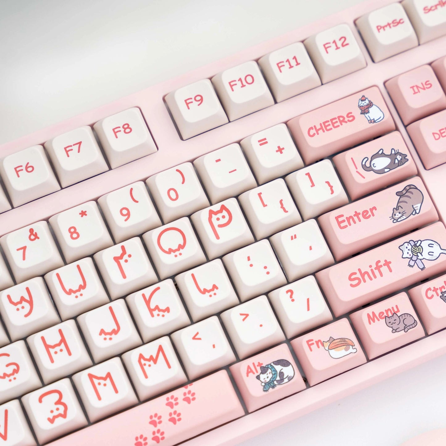 Bottom section close-up of Cat Planet Keycap Set featuring adorable cat paw prints and designs.