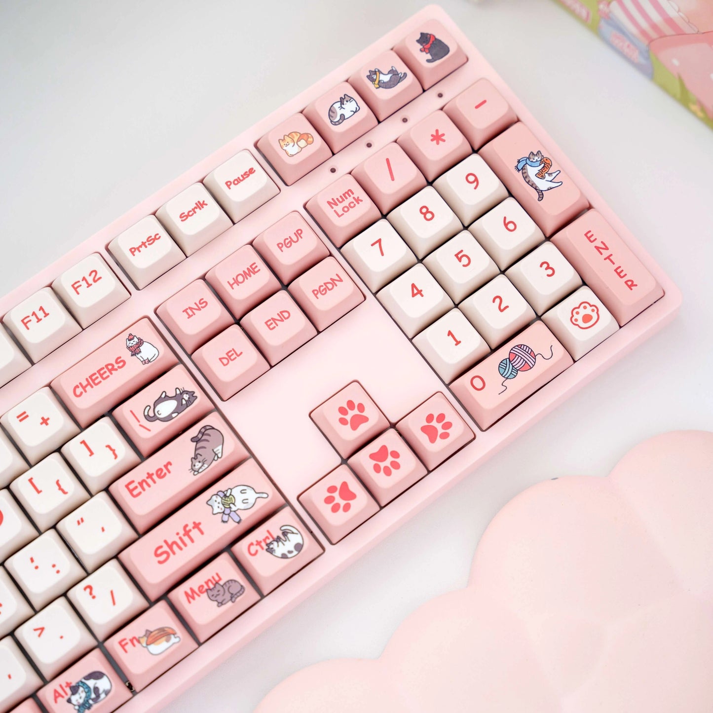 Close-up view of the top section of Cat Planet Keycap Set with various cat designs