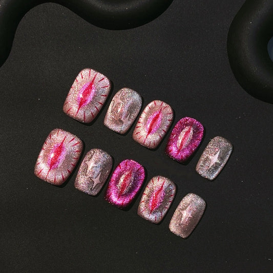 Cupid's Purr-glow Handmade Press On Nails with pink glitter cat-eye design for cat lovers.
