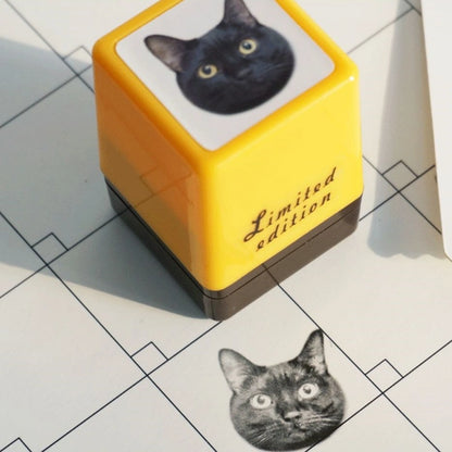 Yellow custom pet stamp featuring a black cat with fine detail, clearly displaying the cat's whiskers, shading, and intricate features.