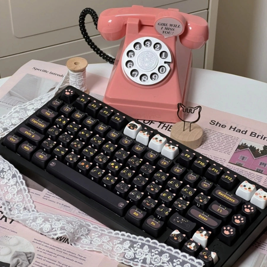 Cute Black Cat Keycap Set on a mechanical keyboard, featuring adorable cat faces and paw prints.