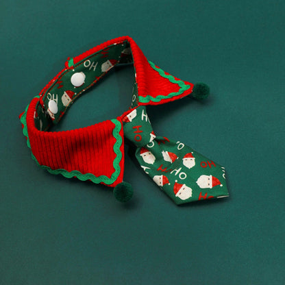 Adorable Festive Paws pet tie featuring Santa and festive holiday colors for cats and dogs.