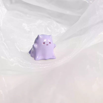 Halloween ghost kitten keycap, Ghostly Whiskers, a spooky and cute addition to any mechanical keyboard.
