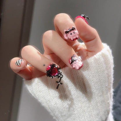 Gothic Meow press on nails with black cats, spider webs, and skulls