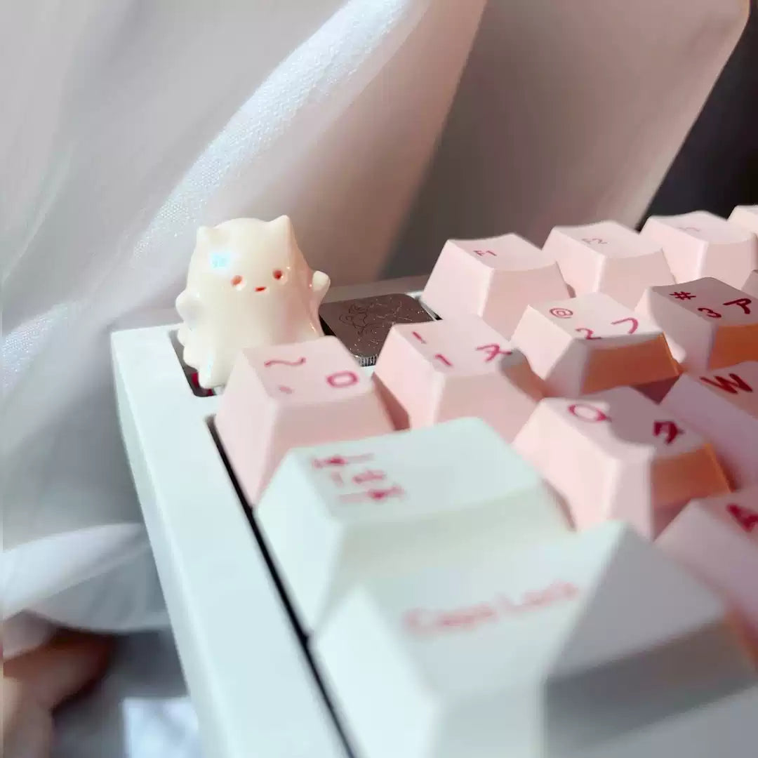 Ghostly Whiskers keycap with a cute ghost kitten design, perfect Halloween gift for gaming setups.
