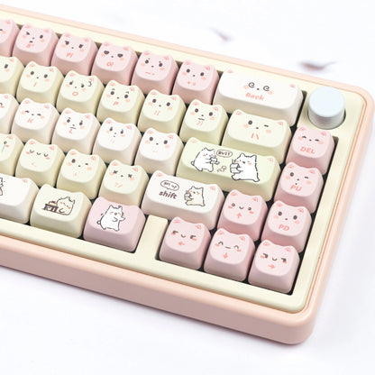 Cute white cat-themed keycap set in pastel pink and yellow colors, perfect for gamers and cat lovers.