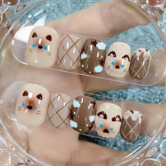 Mee-wow Mocha handmade press-on nails with Siamese cat face designs, perfect for cat lovers