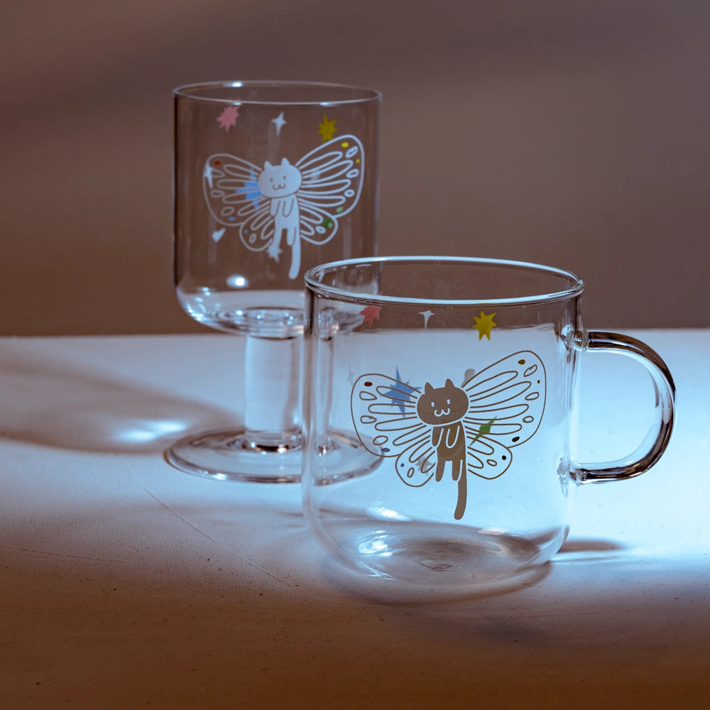 Meowgical Wings Handmade Wine Glass featuring a cute white cat with butterfly wings, perfect for cat lovers.