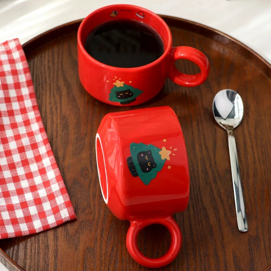 Festive mug with black cat and Christmas tree design, a perfect Xmas gift for cat owners.