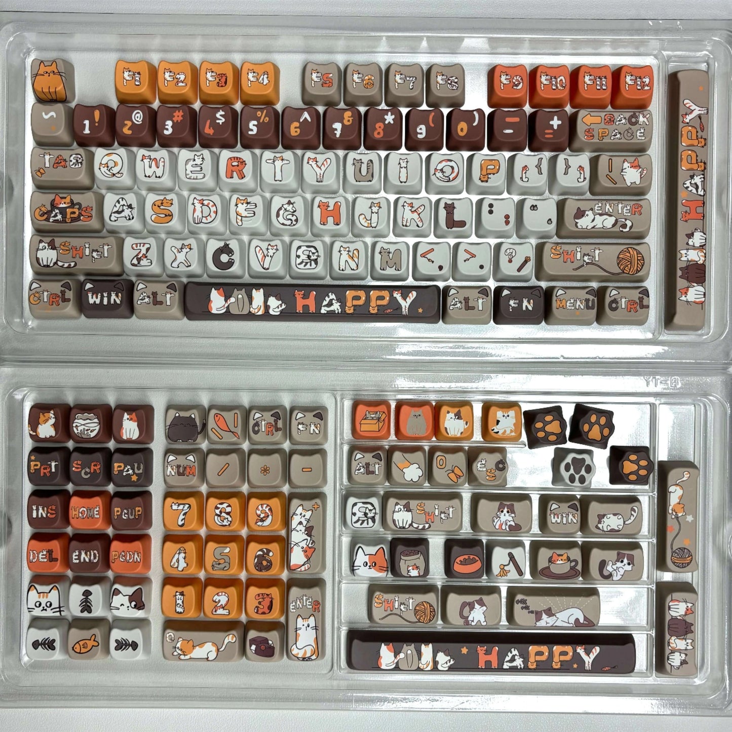 Full layout view of the Naughty Tabby Kitty Keycap Set featuring gray, white, orange, and brown colors with cat-themed keycaps.