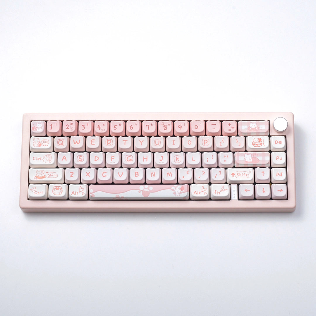 The Party Cat Keycap Set arranged on a keyboard, showcasing the fun and whimsical cat designs in pink tones.