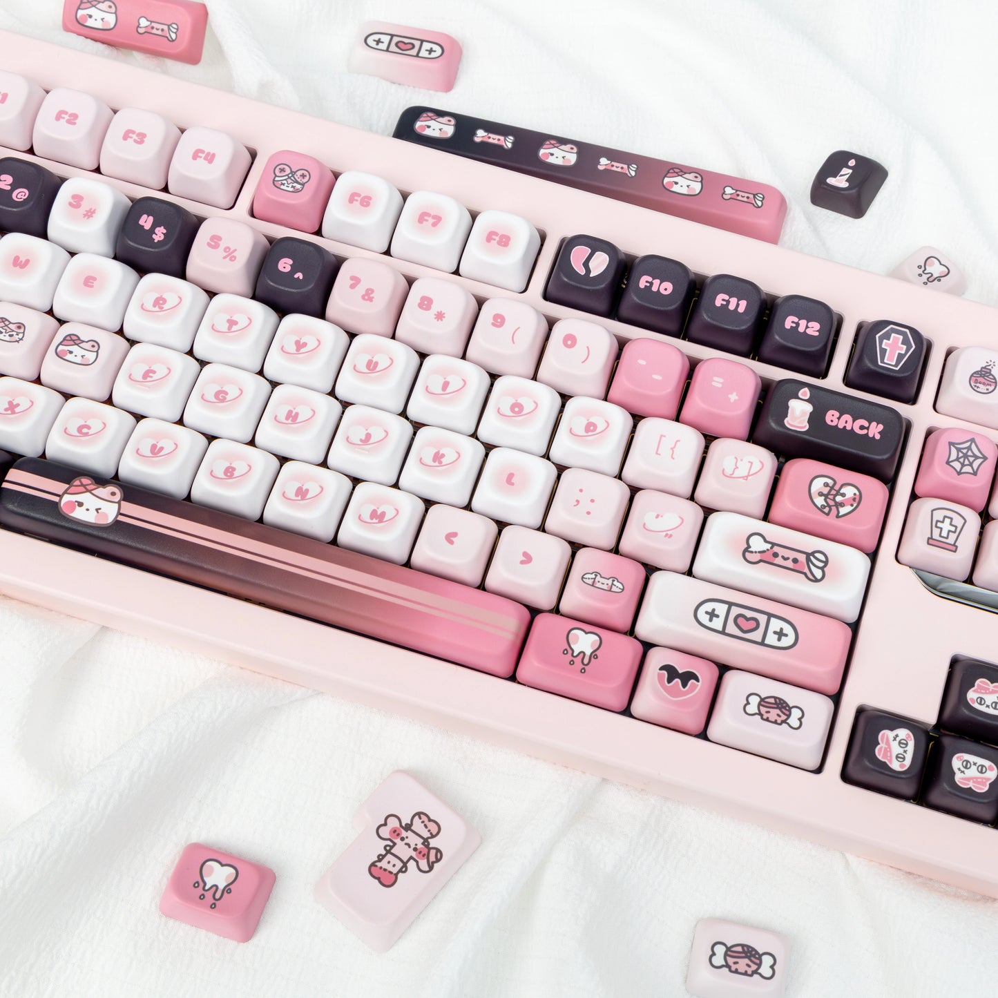 Cute Y2K-inspired pink and black keycap set with cat designs, perfect for gamer girls.