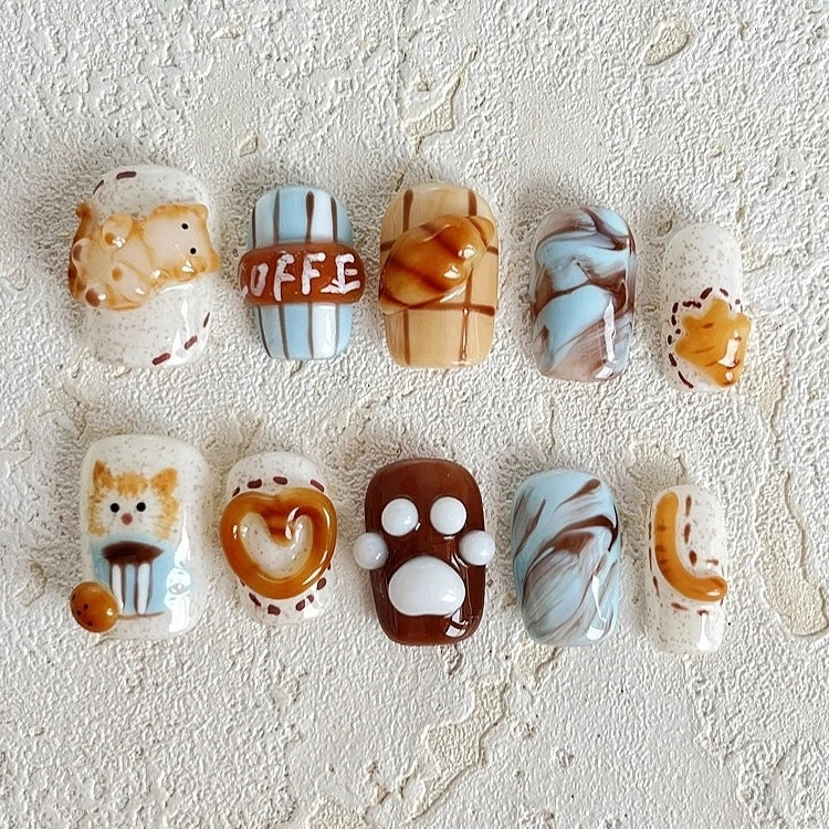 Handmade cute cat press-on nails with ginger cat and latte art design for cat lovers
