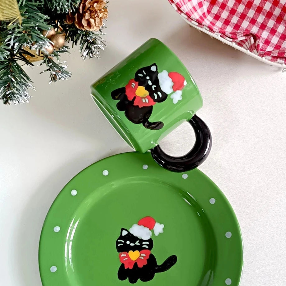 Santa's Little Meow ceramic mug and plate set with festive black cat design
