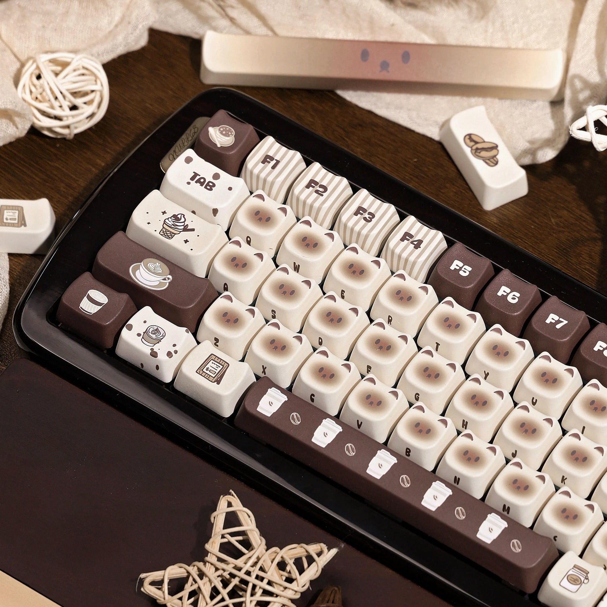 Siamese Brew-tique Keycap Set featuring brown and white Siamese cat designs for mechanical keyboards.