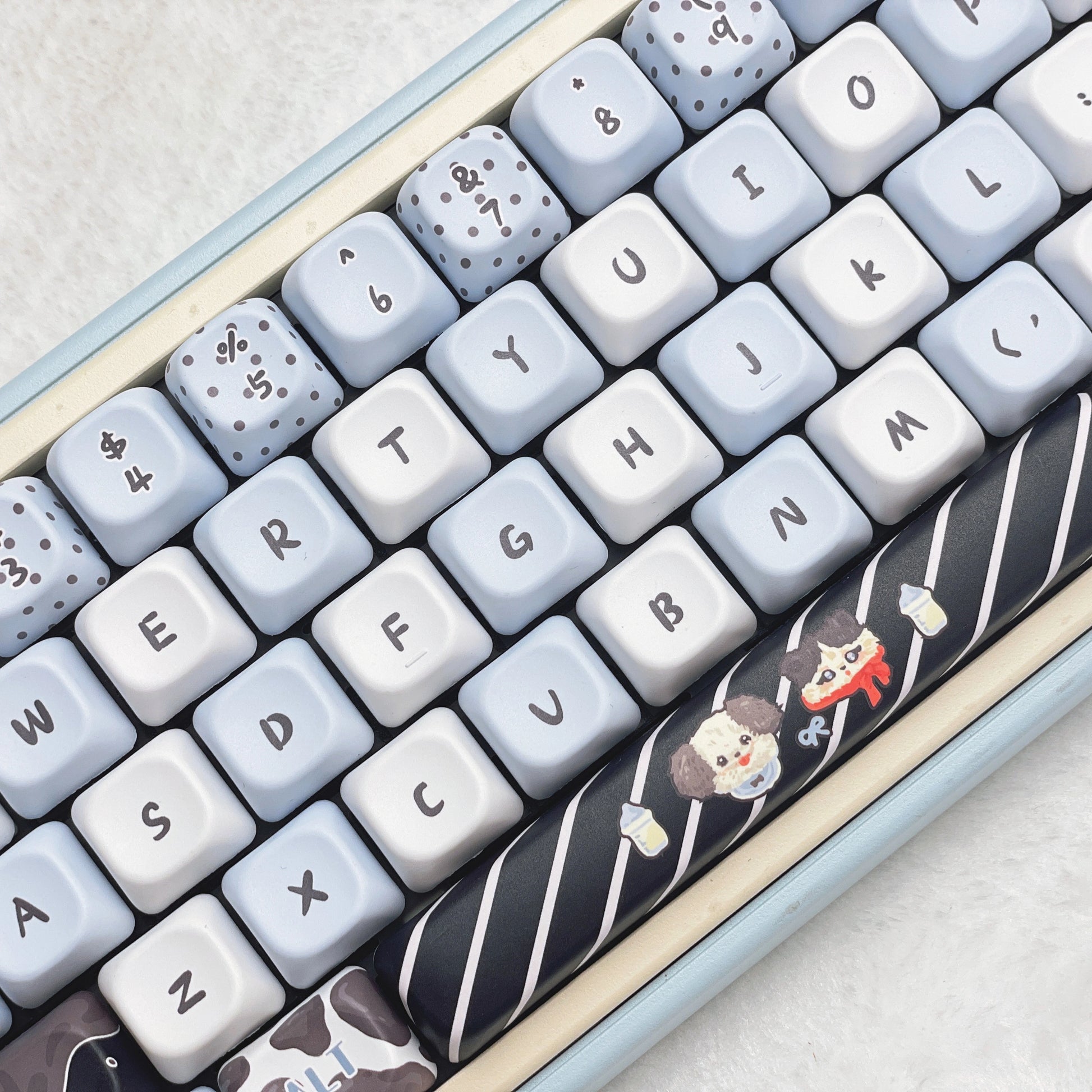 Cute blue keycap set with tuxedo cats and playful patterns, perfect for mechanical keyboards.